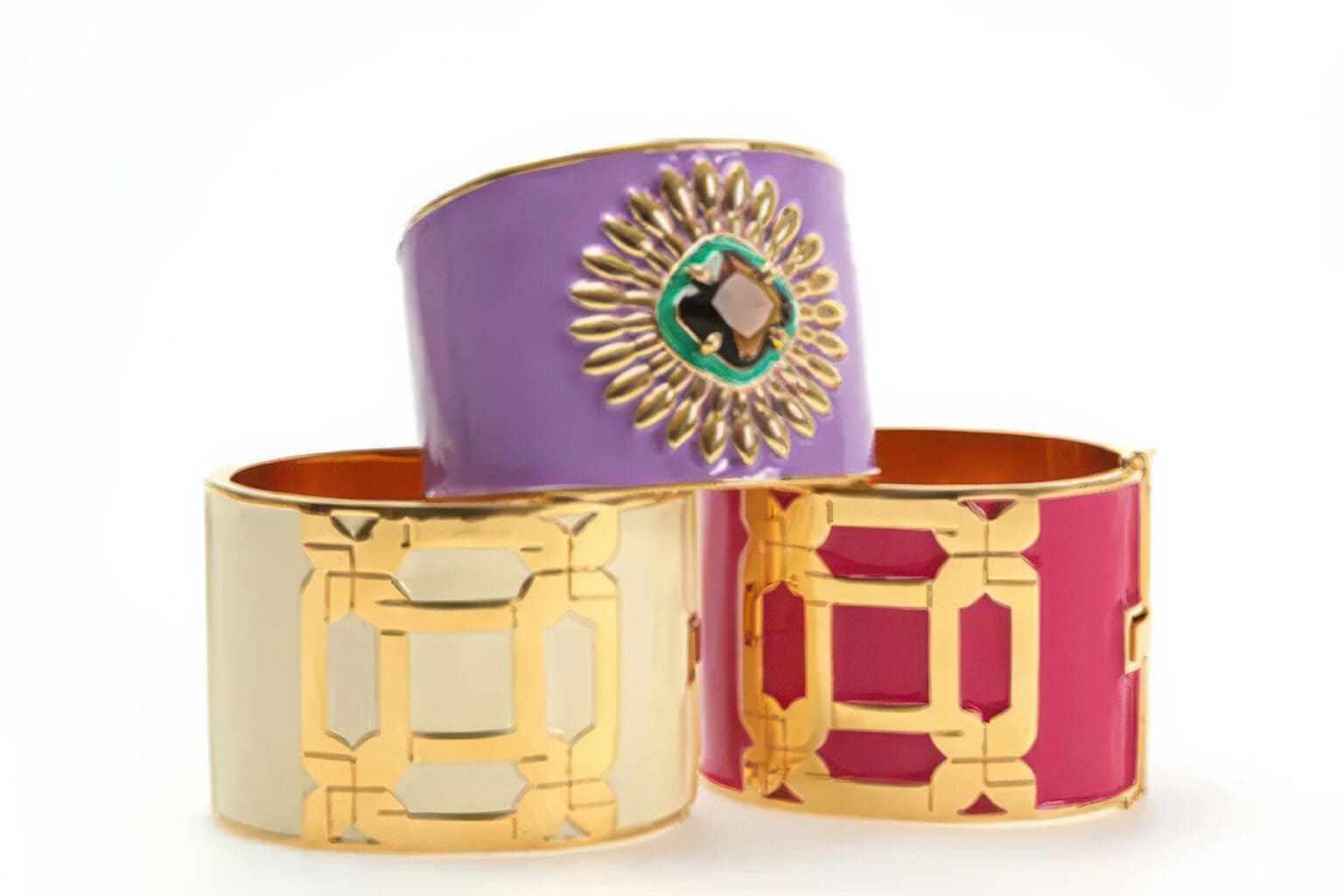 Three bracelets with different colors and designs on them.